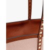 Canvas and leather shoulder bag with iconic studs