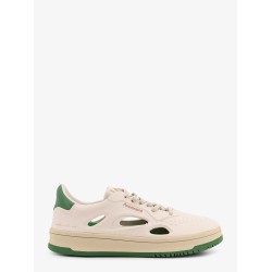 Low-top sneakers realized with foam with lateral openwork