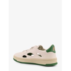 Low-top sneakers realized with foam with lateral openwork