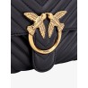 Matelassé leather handbag with iconic love birds buckle