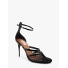 Thong sandals in fishnet and patent leather