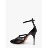 Thong sandals in fishnet and patent leather