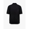 Knitted polo shirt with ribbed profiles