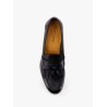Leather loafer with iconic tassels