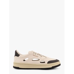 Low-top sneakers realized with foam with lateral openwork