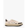 Low-top sneakers realized with foam with lateral openwork