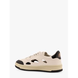 Low-top sneakers realized with foam with lateral openwork