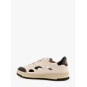 Low-top sneakers realized with foam with lateral openwork