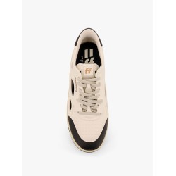 Low-top sneakers realized with foam with lateral openwork