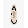 Low-top sneakers realized with foam with lateral openwork