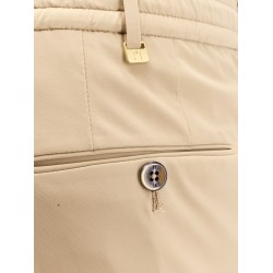 Kinetic fabric trouser with internal drawstring