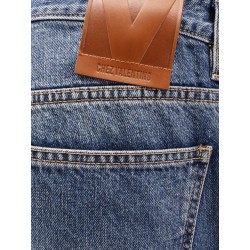 Jeans con chez valentino tag