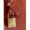 Sac de jour nano patent leather handbag with metal padlock