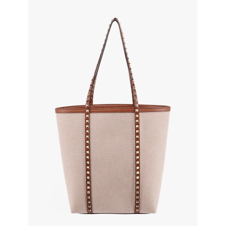 Leather and canvas shoulder bag with iconic studs