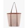 Leather and canvas shoulder bag with iconic studs