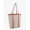 Leather and canvas shoulder bag with iconic studs