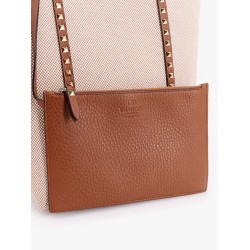 Leather and canvas shoulder bag with iconic studs