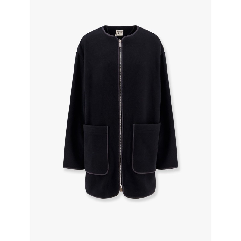 Wool blend coat with lateral slits