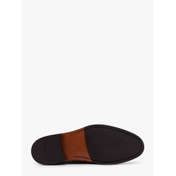 Suede loafer with tassels