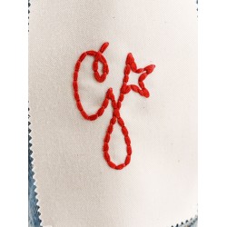 Denim jacket with embroidered monogram