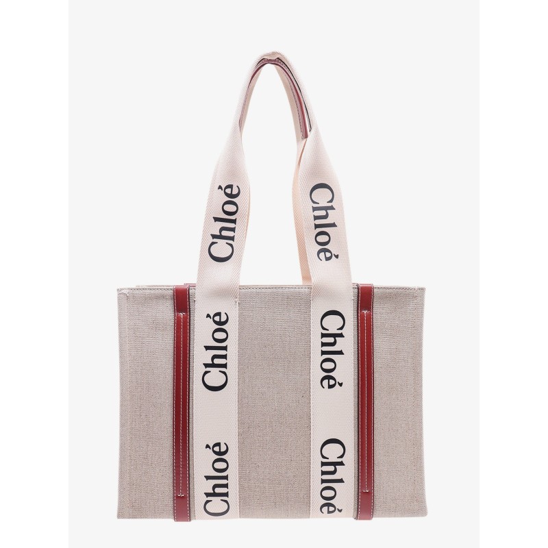 Linen shoulder bag with logo print.this bag is made with lower environmental impact material