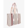 Linen shoulder bag with logo print.this bag is made with lower environmental impact material