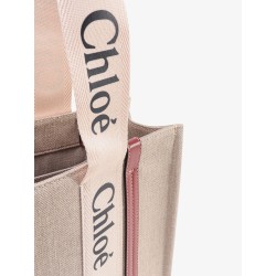 Linen shoulder bag with logo print.this bag is made with lower environmental impact material