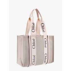 Linen shoulder bag with logo print.this bag is made with lower environmental impact material