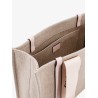 Linen shoulder bag with logo print.this bag is made with lower environmental impact material