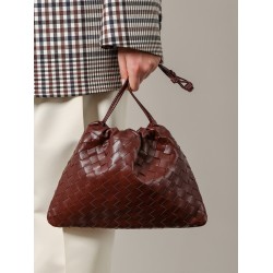 Leather clutch with intrecciato motif
