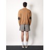 Cashmere cardigan with intrecciato iconic motif leather  details