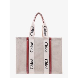 Linen shoulder bag with logo print. this bag is made with lower environmental impact material