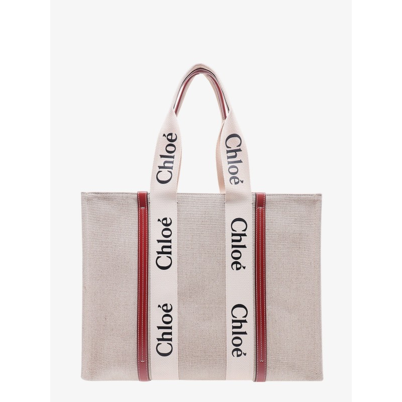 Linen shoulder bag with logo print. this bag is made with lower environmental impact material