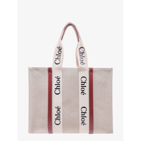 Linen shoulder bag with logo print. this bag is made with lower environmental impact material