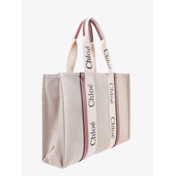 Linen shoulder bag with logo print. this bag is made with lower environmental impact material
