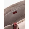 Linen shoulder bag with logo print. this bag is made with lower environmental impact material