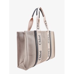 Linen shoulder bag with logo print. this bag is made with lower environmental impact material