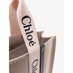 Linen shoulder bag with logo print. this bag is made with lower environmental impact material