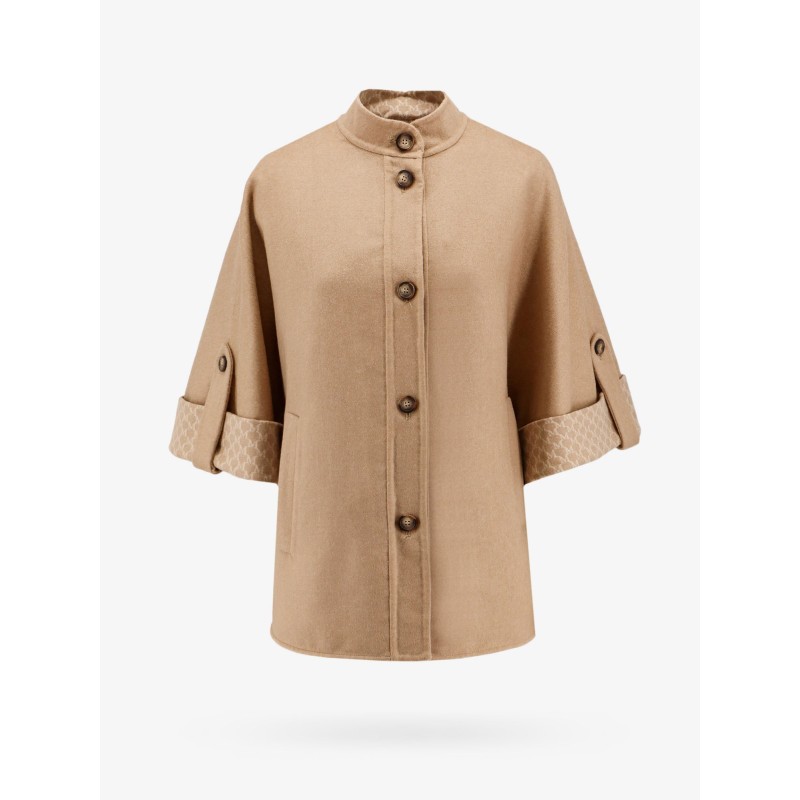 Virgin wool and cashmere cape wih pockets on the front