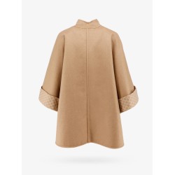 Virgin wool and cashmere cape wih pockets on the front