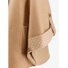 Virgin wool and cashmere cape wih pockets on the front