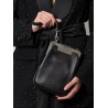 Leather handbag with metal logoed detail