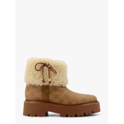 Bulky leather boots with triomphe all-over motif