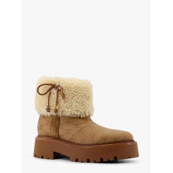 Bulky leather boots with triomphe all-over motif