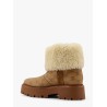 Bulky leather boots with triomphe all-over motif