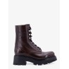 Leather boots with engraved logo