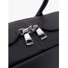 Leather handbag with engraved logo