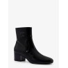 Patent leather boots with engraved triomphe logo