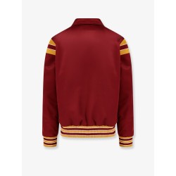Satin bomber with enamelled snap buttons, striped ribbed inserts and triomphe embroidery