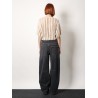 Black denim trouser with leather logo tag